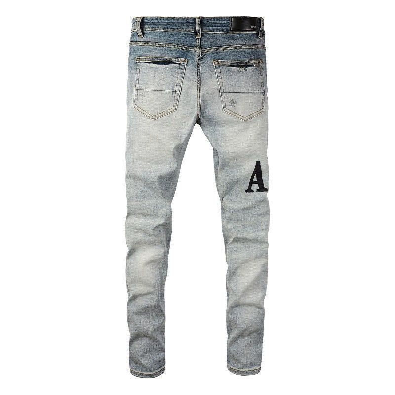 Distressed Patch Jeans Amiri