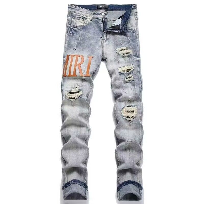 Distressed Patch Jeans Amiri