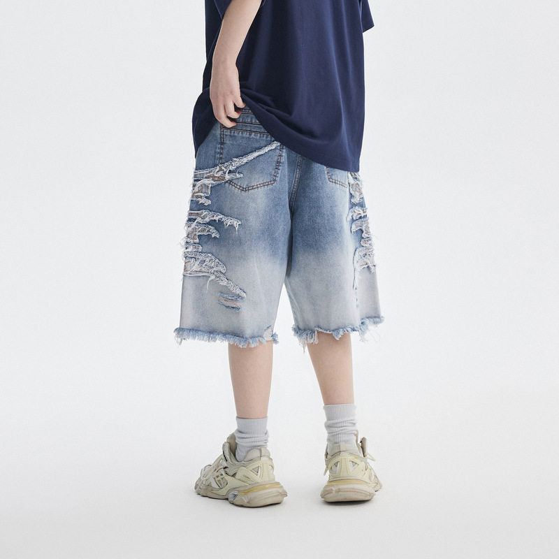 Distressed denim shorts
