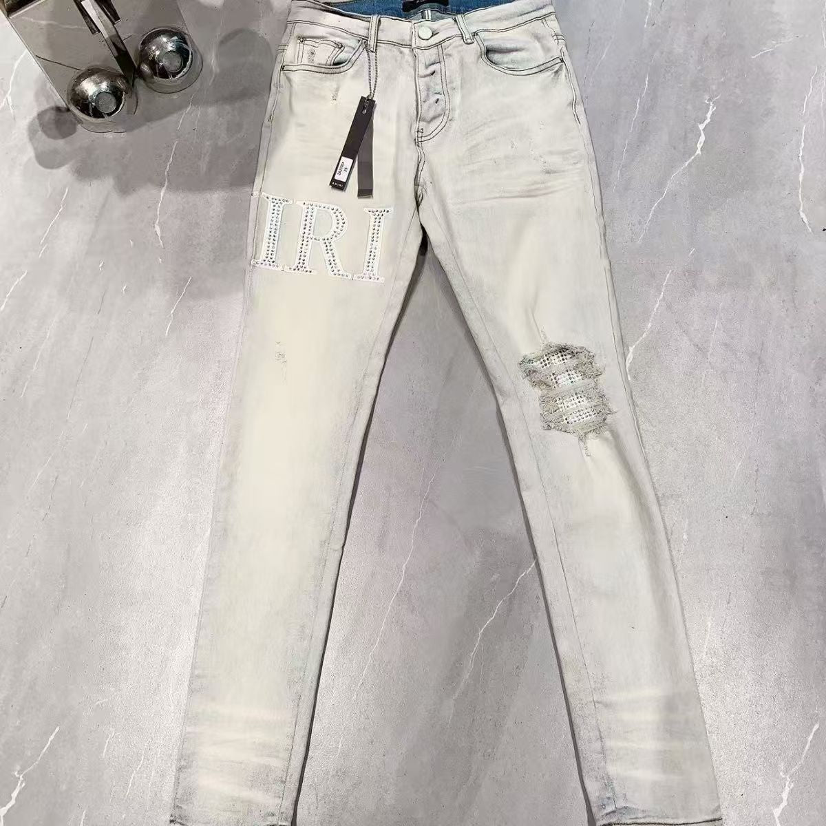 Distressed Patch Jeans Amiri